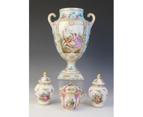 A continental porcelain chocolate cup and cover, 19th century, of compressed lobed form, hand painted with alternating polych