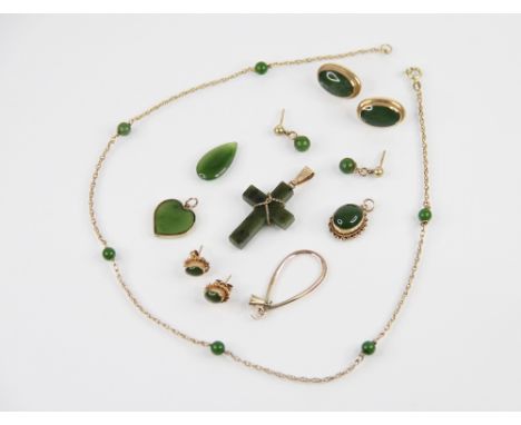 A selection of jade set jewellery, to include; A 14ct gold jade set chain, the 14ct gold rope twist chain set with six polish