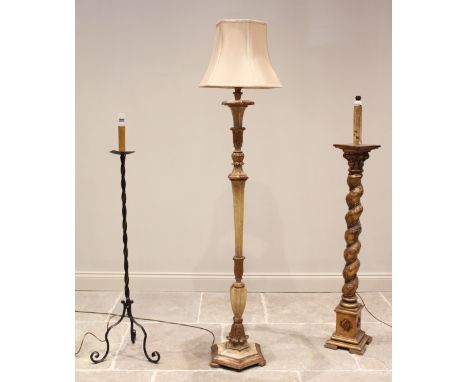 An early 20th century giltwood and gesso standard lamp, of architectural column form, the barley twist pillar applied with re