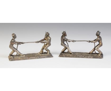 A pair of 19th novelty silver plated knife rests by William Hutton &amp; Sons, in the form of a sailor and a soldier in a tug