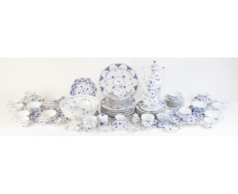 A pair of Royal Copenhagen blue and white hors d'oeuvres dishes, each of trefoil form with shaped pierced rim and ring handle