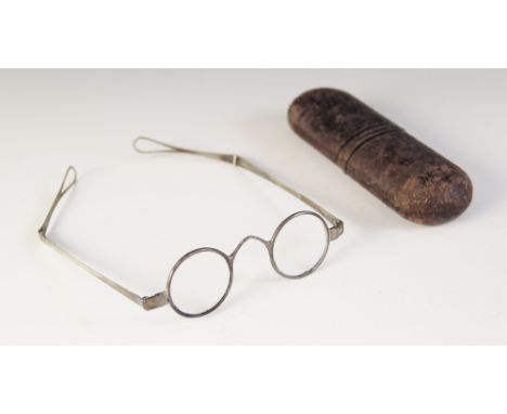 A pair of George III silver spectacles, marks for 'TP', probably London 1801, circular frames with plain polished mounts and 