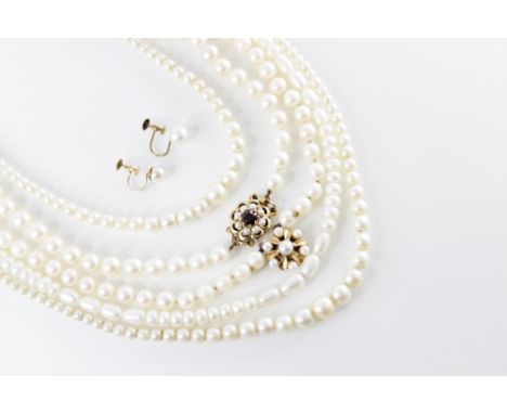 A cultured pearl necklace with a 9ct gold garnet and pearl set clasp, 48cm long, together with a cultured pearl necklace with