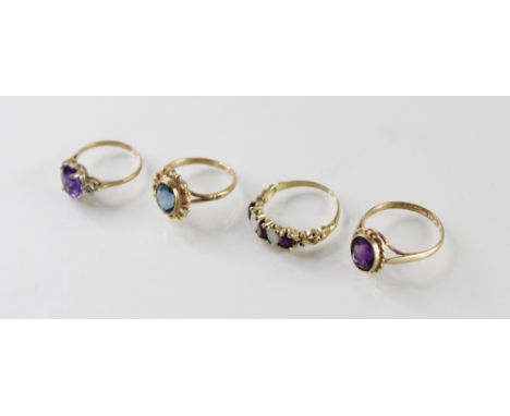 Four 9ct gold gemstone set dress rings, to include an opal and amethyst five-stone ring, size O, an amethyst and diamond thre