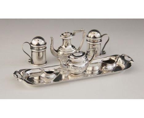 A miniature silver tea service, John Rose, Birmingham 1956, comprising teapot, hot water jug, milk jug and sucrier, each of c