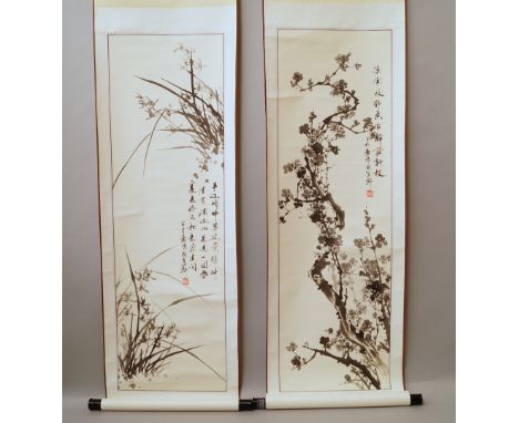 A Chinese painting of orchids, together with rows of calligraphy and seals, mounted as a scroll, 109 x 34cm, together with an