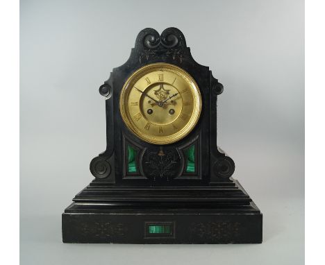 A French slate and malachite inlaid mantel clock, late 19th/early 20th century, the case of architectural design with scrolli
