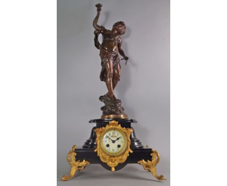 A French mantel clock, late 19th century, mounted with a bronzed spelter figure of Cerces, the gilt metal mounted plinth of s