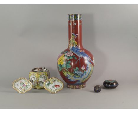 A Chinese cloisonne vase, 20th century, decorated with phoenix and flowers on a red ground, 38.5cm high, together with a Chin