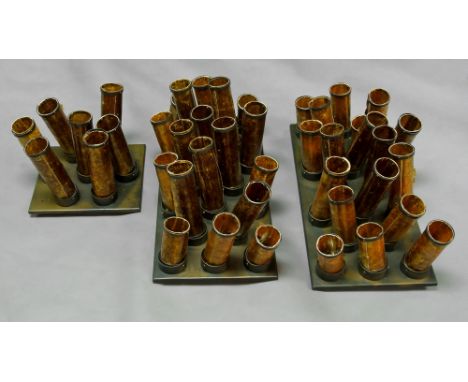 A pair of rectangular ceiling lights, 20th century, the frames of steel, hung with 18 lights, with cylindrical copper coloure
