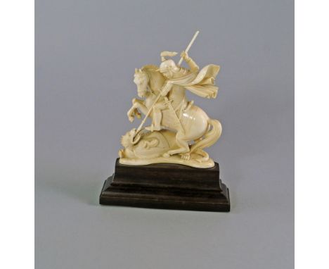 A Continental school ivory sculpture of St. George and the Dragon, possibly Dieppe, late 19th century, modelled in typical fo