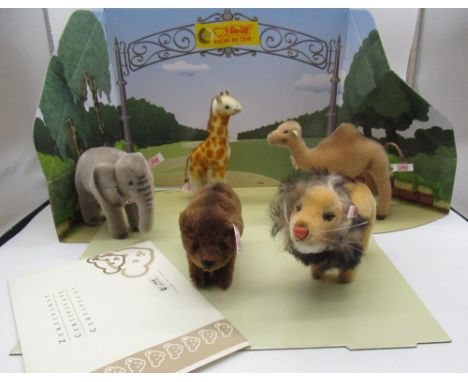 Steiff Zoo Set including lion, bear, giraffe, elephant and a camel, complete with box that folds out to form a display, Limit