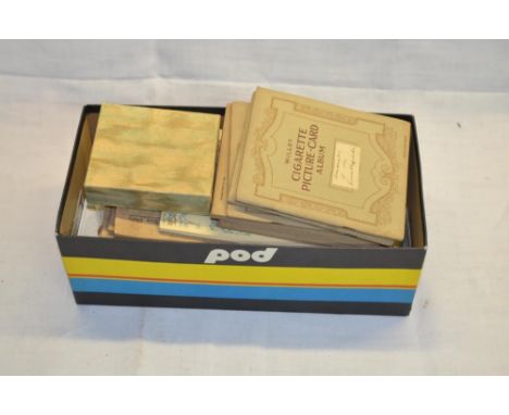 Extensive collection of vintage cigarette cards, includes a number of completed albums, covering a wide variety of subjects s