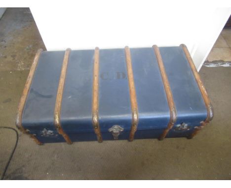 Vintage navy blue and wooden slatted flat top trunk with leather carrying handles with internal lift out tray 