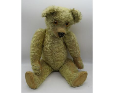 Chad Valley c1920s Moon Eyed straw filled teddy bear in golden mohair with large glass eyes, jointed arms and legs, swivel he