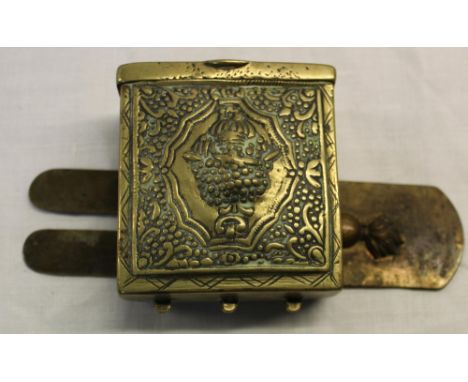 C19th Turkish style brass cartridge pouch, hinged rectangular top, engraved detail, embossed scenes to the front, twin belt l