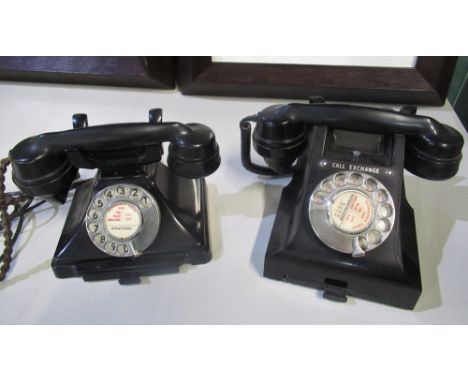 Two early to mid C20th Bakelite telephones with address drawers, one with call exchange button, both converted to modern land