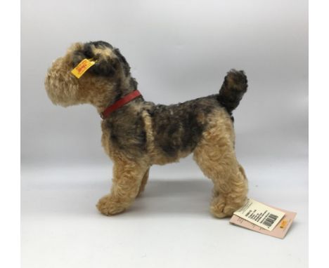 Steiff Classic 1935 Fellow Terrier in blonde and black mohair with red collar, with tag, H30cm 