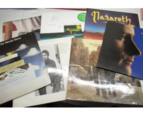 Selection of various pop and rock records including Bruce Springsteen, Aha, Nazareth, Bob Dylan, The Village People, Buddy Ho