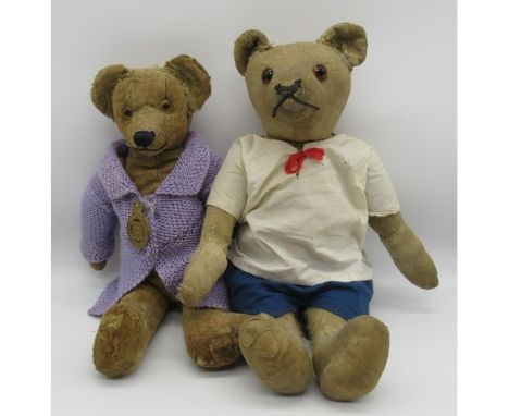 Chad Valley c.1920's straw filled teddy bear with glass eyes, jointed arms and legs and swivel head, wearing a lilac coat wit