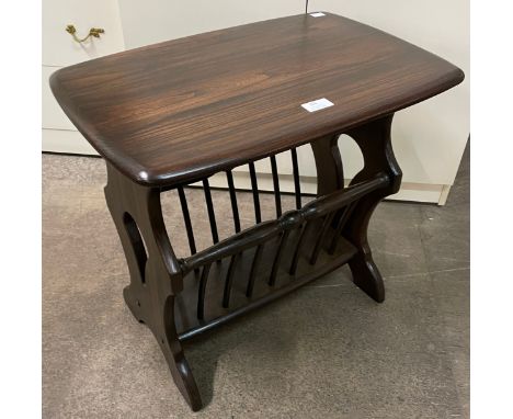 An Ercol Golden Dawn ash magazine rack 