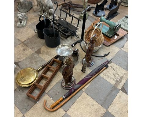 A pair of cast metal fireplace figures, an air pump, brass warming pan, wicker baskets, scales, sewing machine, etc.