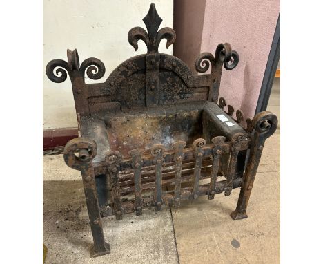 A French style cast iron fire grate 