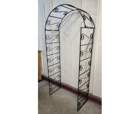 A Victorian style wrought iron garden arch 
