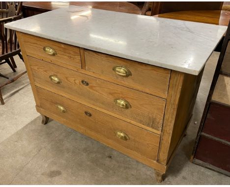 A 19th Century French pine and marble topped commode 