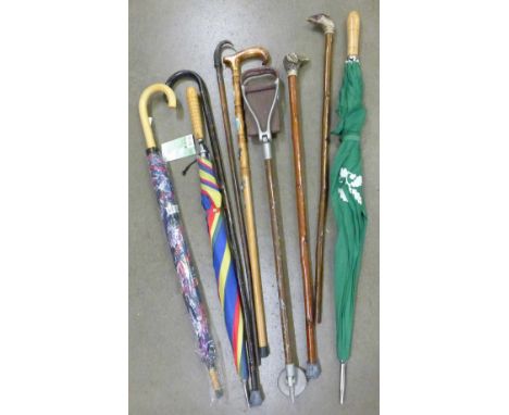 A silver mounted walking stick, umbrellas, a shooting stick and other sticks (9)