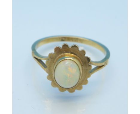 A 9ct gold and opal ring, 1.7g, N