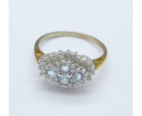 A 9ct gold, diamond and blue stone ring, 2.6g, S