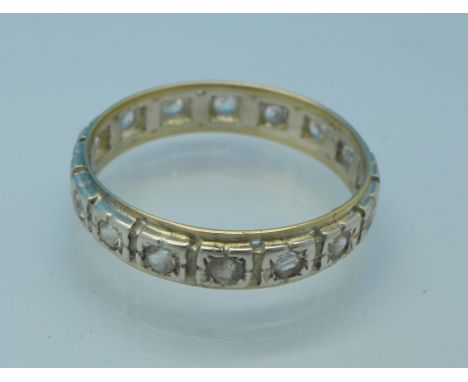 A 9ct gold, silver and white stone eternity ring, Q