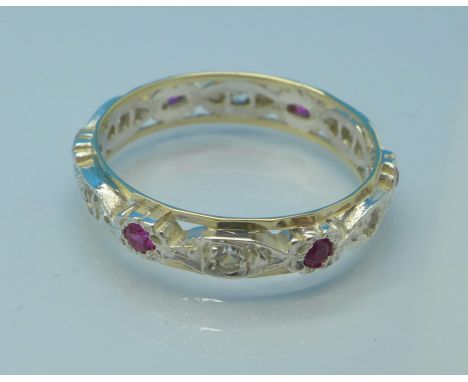 A 9ct gold, silver, red and white stone eternity ring, Q