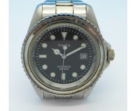 A Timex Indiglo wristwatch, WR50M, lacking bezel