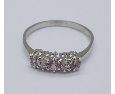 A 9ct white gold, diamond and pink stone ring, 2.1g, S