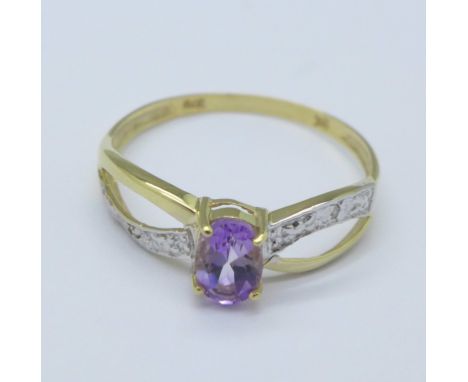 A 9ct gold, amethyst and diamond ring, 0.9g, O