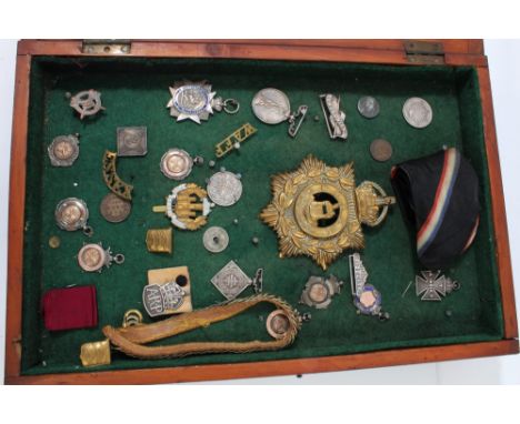 Edwardian brass Essex Regiment helmet plate, together with various Army Temperance medals, fobs and badges
