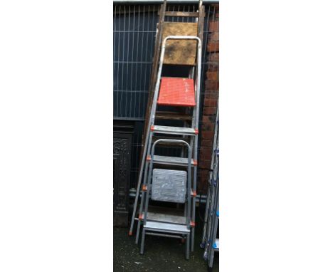 Four sets of step ladders
