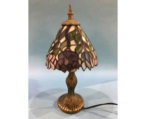A small modern Tiffany style table lamp and shade