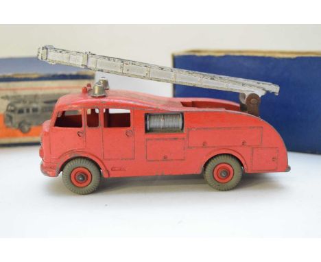 Dinky die-cast toy fire engine, No 555, in original box (play worn condition)