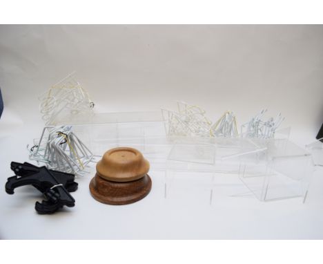 Quantity of ceramic display stands for tea pots and saucers, plates, together with some plastic stands (qty)