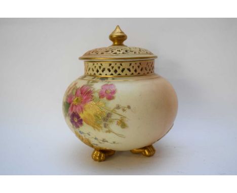 Royal Worcester globular vase with reticulated neck and cover, the blush ground decorated with flowers