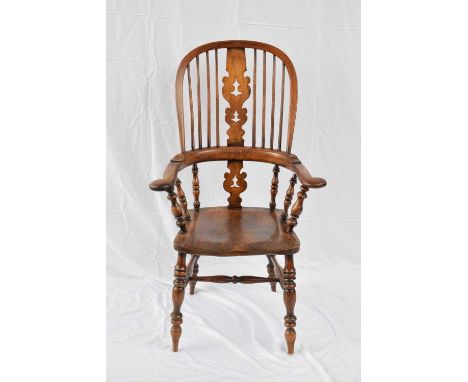 19th century elm seated stick back Windsor chair raised on turned legs with H stretcher