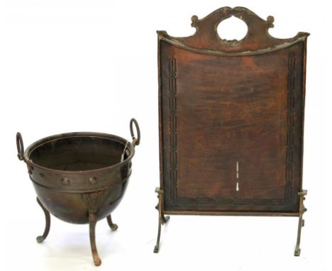 AN ARTS AND CRAFTS COPPER FIRESCREEN AND A COPPER CAULDRON ON THREE LEGS, INCLUDING LINER (2)