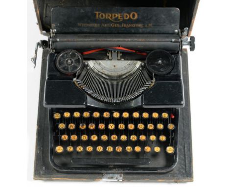 A VINTAGE CASED TYPEWRITER, WITH GERMAN KEYS
