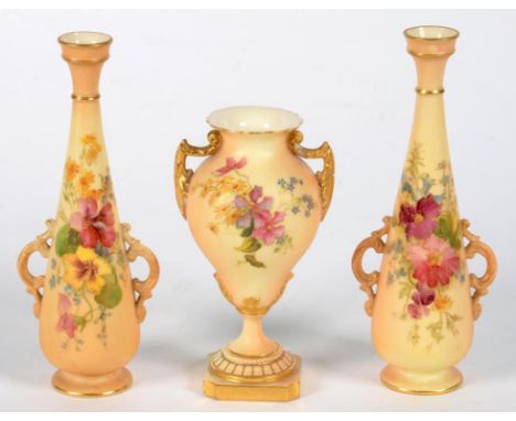 ONE AND A PAIR OF ROYAL WORCESTER VASES, PRINTED AND PAINTED WITH NATURALISTIC FLOWERS ON A SHADED APRICOT GROUND AND GILT, 1