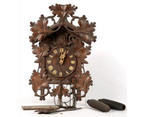 A GERMAN CARVED WOOD CAMERER, KUSS &amp; CO CUCKOO CLOCK, FAULTS 