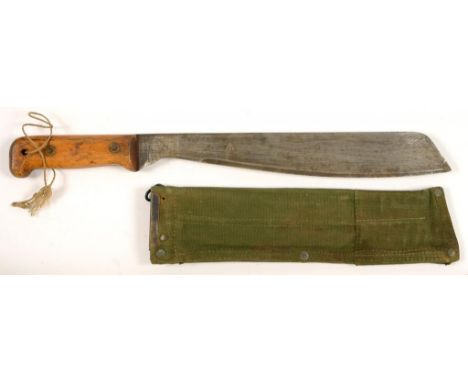 A BRITISH WORLD WAR II JUNGLE KNIFE WITH LIGHT WOOD GRIPS AND METAL MOUNTED STUDDED CANVAS SHEATH, THE BLADE STAMPED BROAD AR