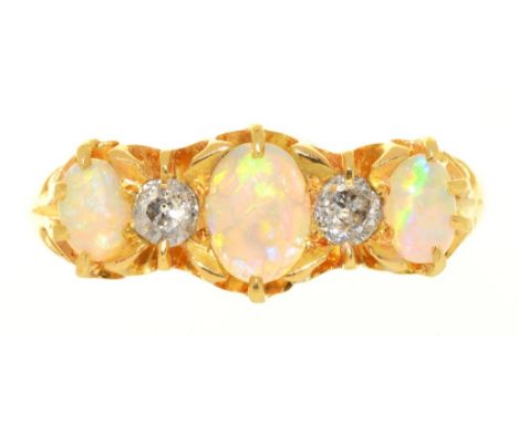 A THREE STONE OPAL AND DIAMOND RING IN 18CT GOLD, BIRMINGHAM 1913, THE CABOCHON OPALS APPROX 0.45CT, OLD CUT DIAMONDS APPROX 